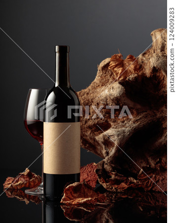 Bottle of red wine with old empty label. 124009283