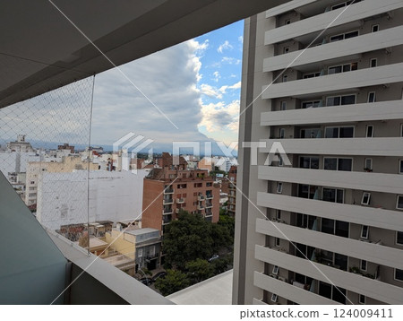 Cordoba, Argentina - 03.15.2025: View from the ninth floor of the Cardinales Cofico complex in cloudy weather. Cordoba, Argentina - 03.15.2025: View from the ninth floor of the Cardinales Cofico complex in cloudy weather. 124009411