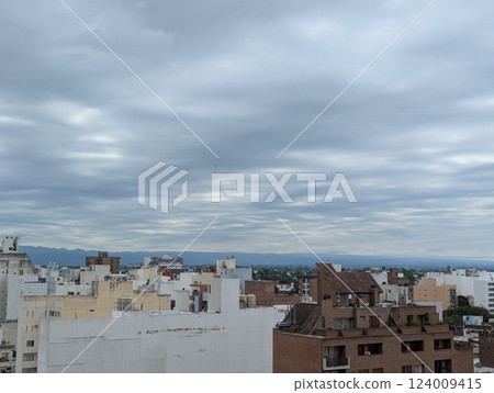 Cordoba, Argentina - 02.17.2025: View of the city from the ninth floor of Cardinales Cofico in cloudy weather. 124009415