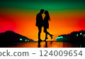 Couple shares a tender moment on the beach at sunset, creating a magical atmosphere filled with love and joy 124009654