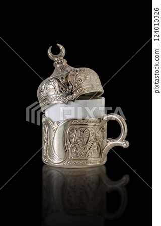 Turkish cup from coffee set on black isolated background there is an outline of the image Turkish cup from coffee set on black isolated background there is an outline of the image 124010326