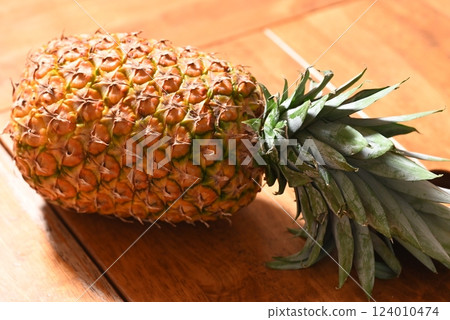 Fresh pineapple, a popular tropical fruit Fresh pineapple, a popular tropical fruit 124010474