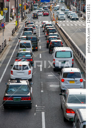 A line of cars jammed on a national highway during the rush hour 124011851