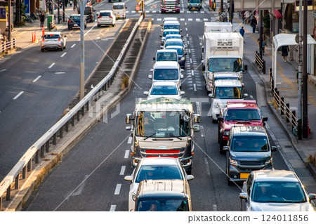 A line of cars jammed on a national highway during the rush hour A line of cars jammed on a national highway during the rush hour 124011856