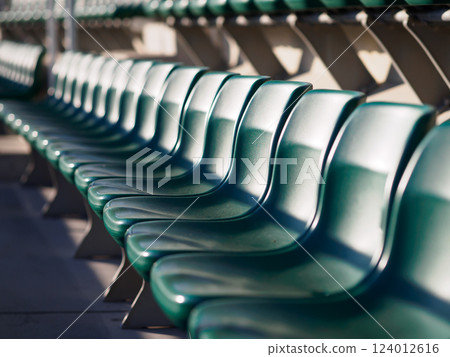 A large number of seats in a stadium 124012616