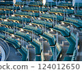 A large number of seats in a stadium 124012650