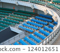 A large number of seats in a stadium 124012651