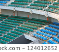 A large number of seats in a stadium 124012652