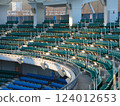 A large number of seats in a stadium 124012653