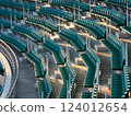 A large number of seats in a stadium 124012654