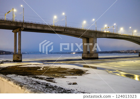 illuminated bridge accross frozen river, Kostroma illuminated bridge accross frozen river, Kostroma 124013323
