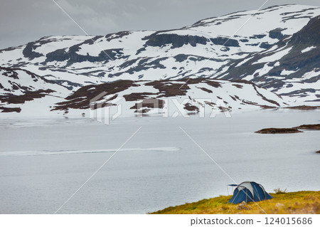 Tent near mountain lake Tent near mountain lake 124015686