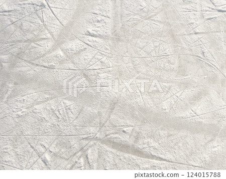 Ice background with marks from skating and hockey. 124015788