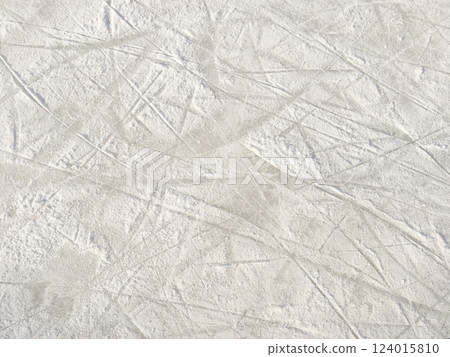 Ice background with marks from skating and hockey. 124015810
