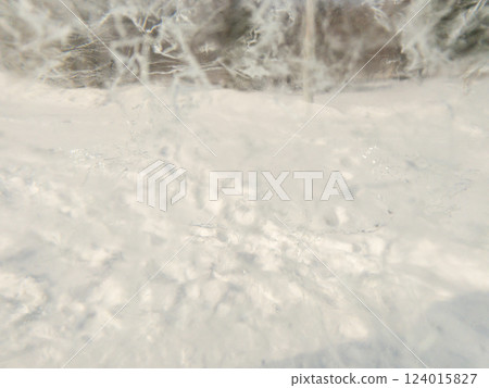 Ice texture background. Textured cold frosty surface of ice block with frozen air bubbles. Ice texture background. Textured cold frosty surface of ice block with frozen air bubbles. 124015827