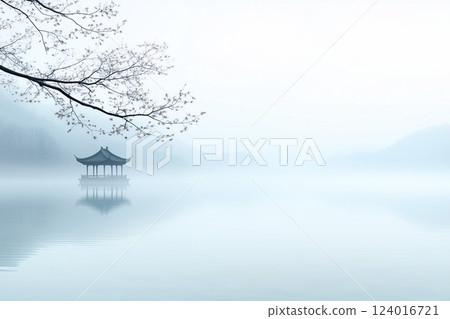 A small wooden boat is floating on a lake A small wooden boat is floating on a lake 124016721