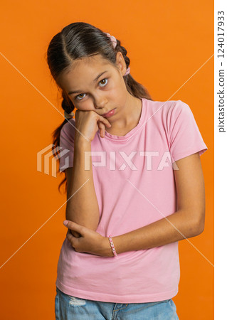 Child girl tired bored expression exhausted of tedious story not interested in communication talk Child girl tired bored expression exhausted of tedious story not interested in communication talk 124017933