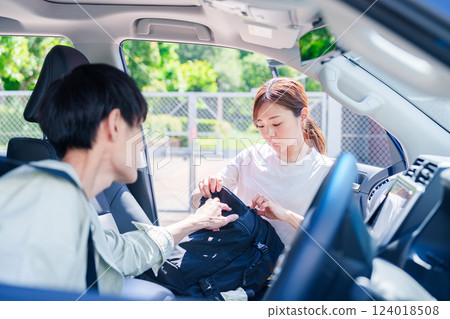 A young husband driving his wife home 124018508