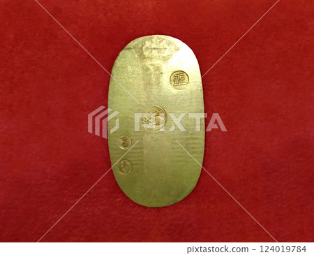 Kyoho koban coin, back, red background Kyoho koban coin, back, red background 124019784