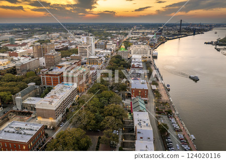 Waterfront River Street in Savannah, Georgia. Historic American architecture of old historical city. USA Southern cityscape at sunset 124020116