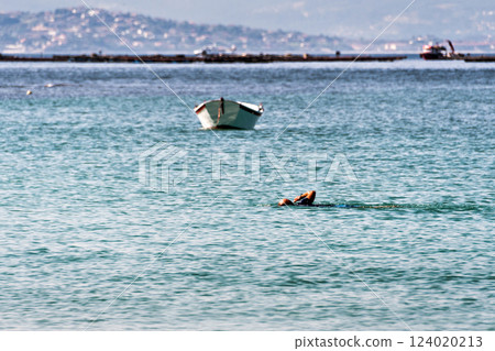 Small fishing boat on the beach of Area de Agra, Sanxenxo, Pontevedra 124020213