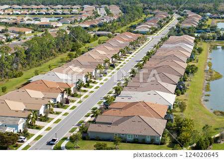 Rich neighborhood with expensive residential homes in southwest Florida. Wealthy suburban area 124020645