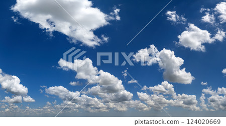 Rain clouds forming on blue Florida sky. Colorful summer skyscape 124020669