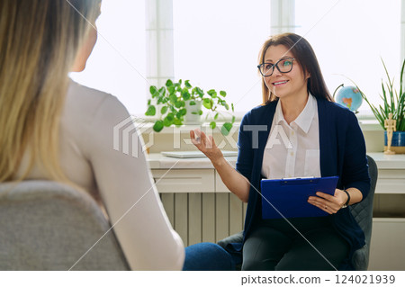 Female psychotherapist, psychologist working with young woman 124021939