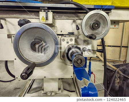 Close-Up of Industrial Machine Handles and Control Mechanisms 124022465