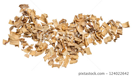 A close-up of dried vegetable pieces, including onion, beetroot, and carrot on isolated background. The mix for soups and seasonings. 124022642