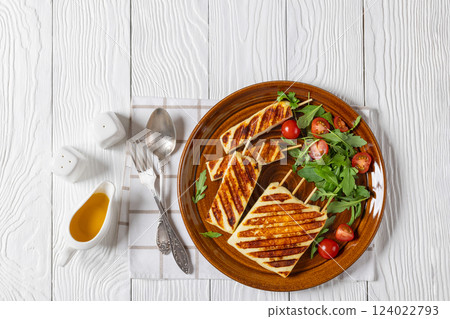 Grilled Greek Halloumi Cheese on sticks, top view 124022793