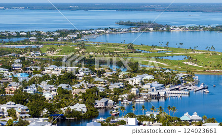 Large residential homes in island small town Boca Grande on Gasparilla Island in southwest Florida. American waterfront houses in rural US suburbs 124023661