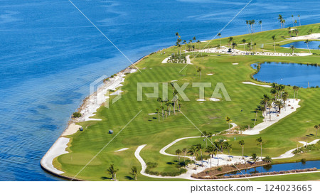 Large golf course and sports grounds with green grass in Boca Grande, small town on Gasparilla Island in southwest Florida 124023665