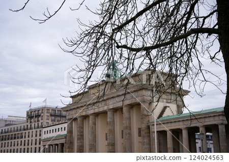 Brandenburg Gate with tree branches in foreground  124024563