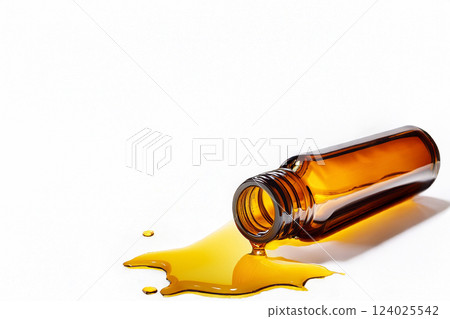 White background: Energy drink that has fallen and spilled 124025542