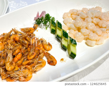 Assortment of Chinese Shanghainese cuisine appetizers: fried shrimp and crispy fried hepaan soup 124025645
