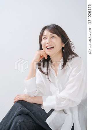 Portrait of a smiley female female 124026336