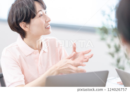 Smiling care manager working in uniform 124026757