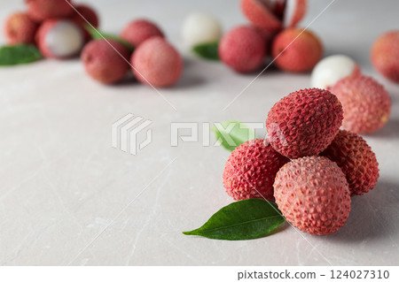 Lychee, concept of fresh and ripe exotic food Lychee, concept of fresh and ripe exotic food 124027310