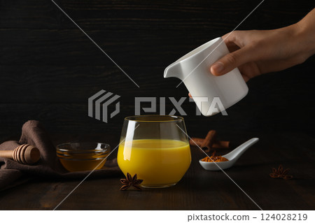 Moon milk, milk with turmeric, concept of different drinks 124028219