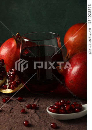 Pomegranate juice, tasty and delicious beverage, fresh drink Pomegranate juice, tasty and delicious beverage, fresh drink 124028268