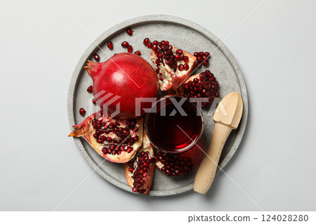 Pomegranate juice, tasty, delicious and fresh drink Pomegranate juice, tasty, delicious and fresh drink 124028280