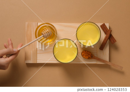 Moon milk, milk with turmeric, concept of different drinks 124028353