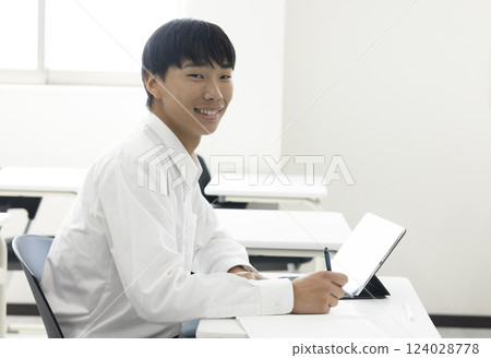 Male students taking classes 124028778