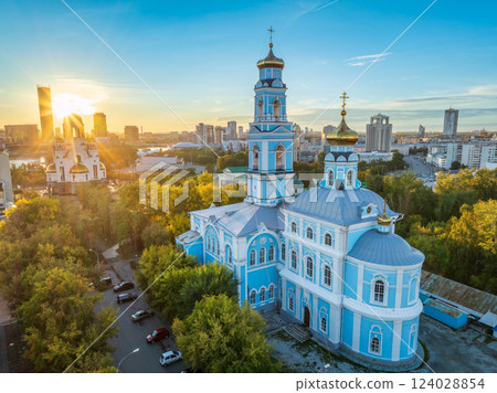Summer Yekaterinburg, Temple of the Ascension and Temple on Blood in beautiful clear sunset. Summer Yekaterinburg, Temple of the Ascension and Temple on Blood in beautiful clear sunset. 124028854