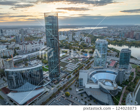 Yekaterinburg city with Buildings of Regional Government and Parliament, Dramatic Theatre, Iset Tower, Yeltsin Center, panoramic view at summer sunset. 124028873