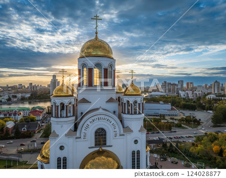 Autumn Yekaterinburg and Temple on Blood in beautiful clear sunset. Aerial view of Yekaterinburg, Russia. Translation of the text on the temple: Honest to the Lord is the death of His saints. 124028877