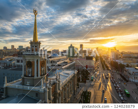 Yekaterinburg City Administration or City Hall and Central square at summer evening. Evening city in the summer sunset, Aerial View. Yekaterinburg City Administration or City Hall and Central square at summer evening. Evening city in the summer sunset, Aerial View. 124028879
