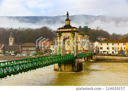 Landscape French commune of Seyssel with the flowing Rhone River and a bridge Landscape French commune of Seyssel with the flowing Rhone River and a bridge 124029257