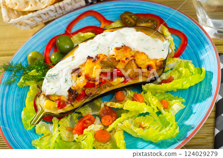 Eggplant with vegetables and baked cheese 124029279